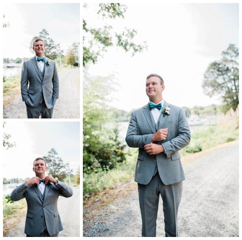 Groom smiles and fixes bow tie on wedding day at The Tides Inn in Irvington, Virginia.
