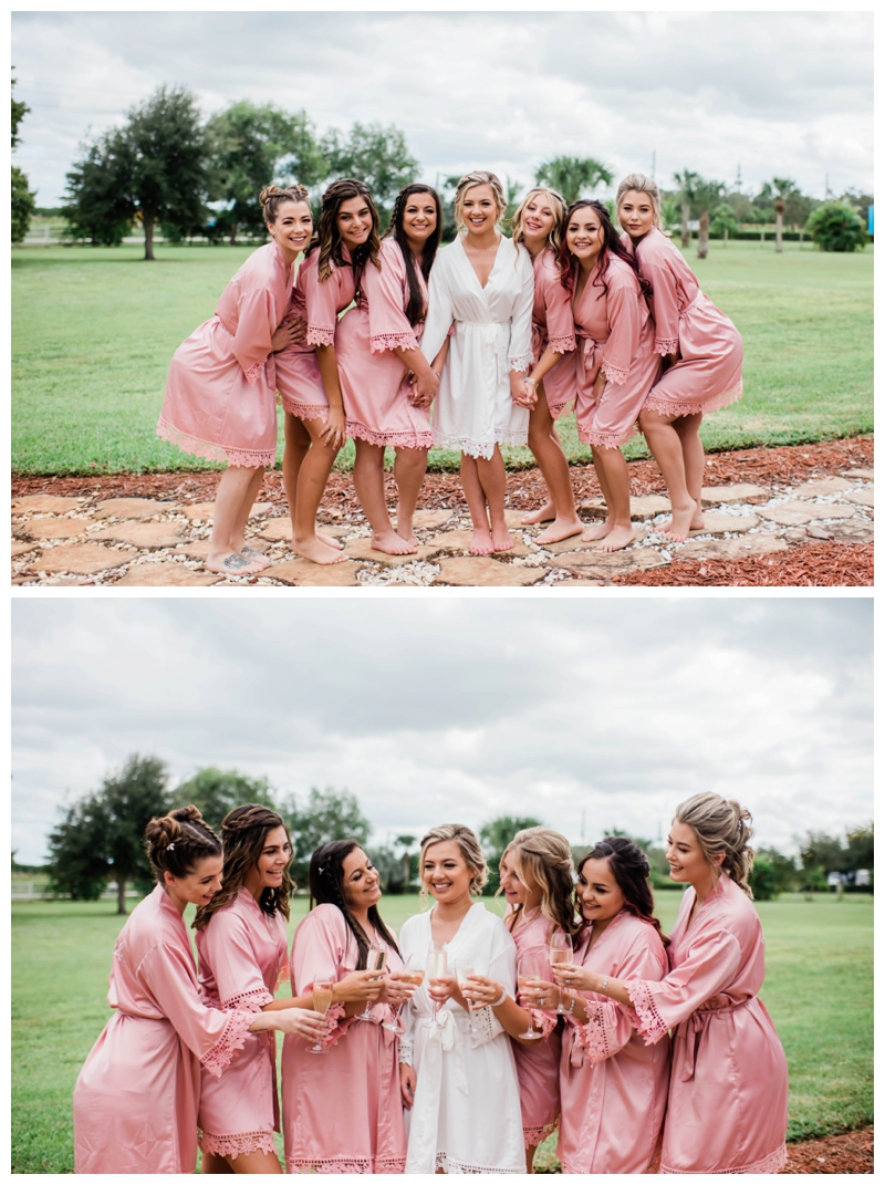 Bride and bridesmaids smile in pale pink silk robes.