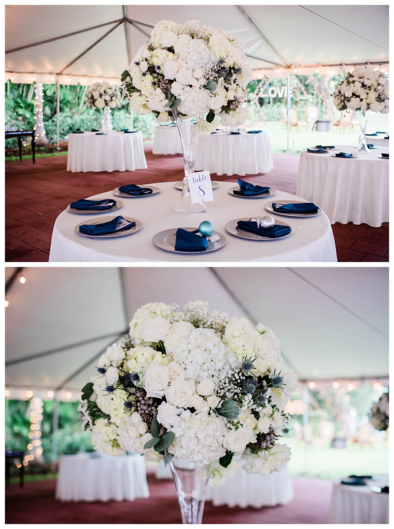 Navy and white reception tablescapes with tall white hydrangea centerpieces