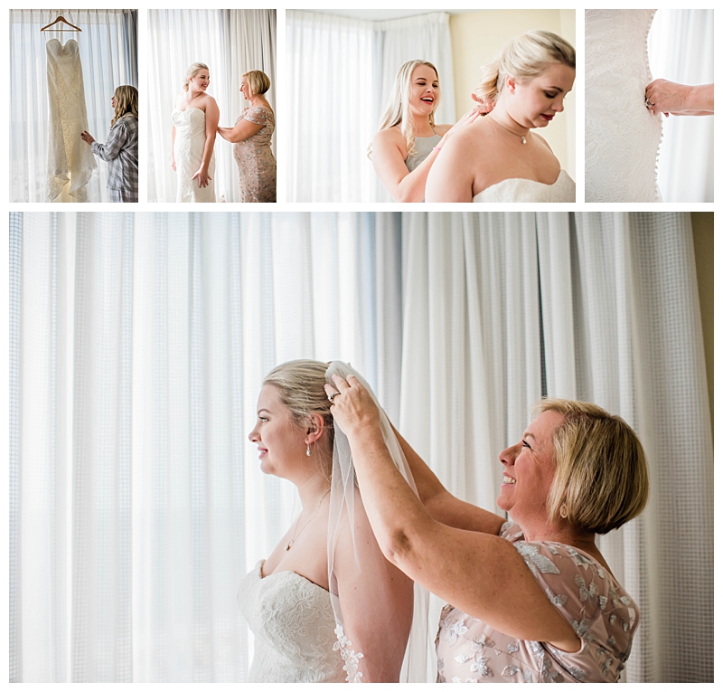 Mother of the bride helps bride with veil and wedding gown on Southwest Florida wedding day
