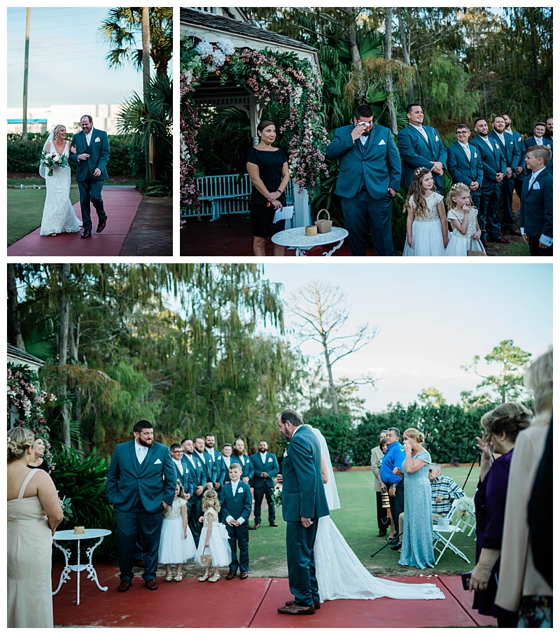 Groom cries as bride walks down the aisle in outdoor Naples wedding.
