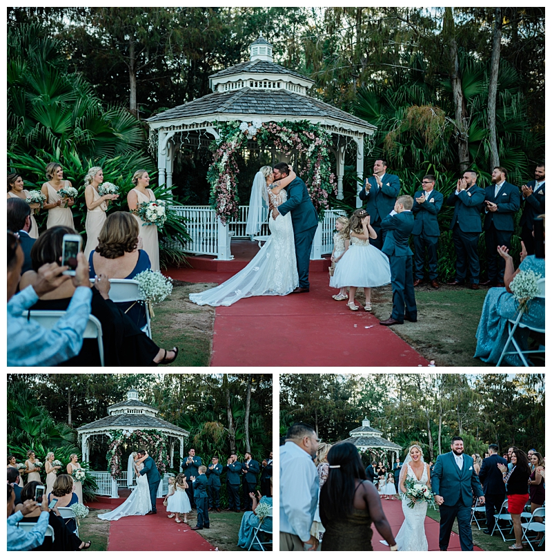 Bride and groom share their first kiss as husband and wife in Etudes de Ballet & Co. wedding venue in Naples, Florida.