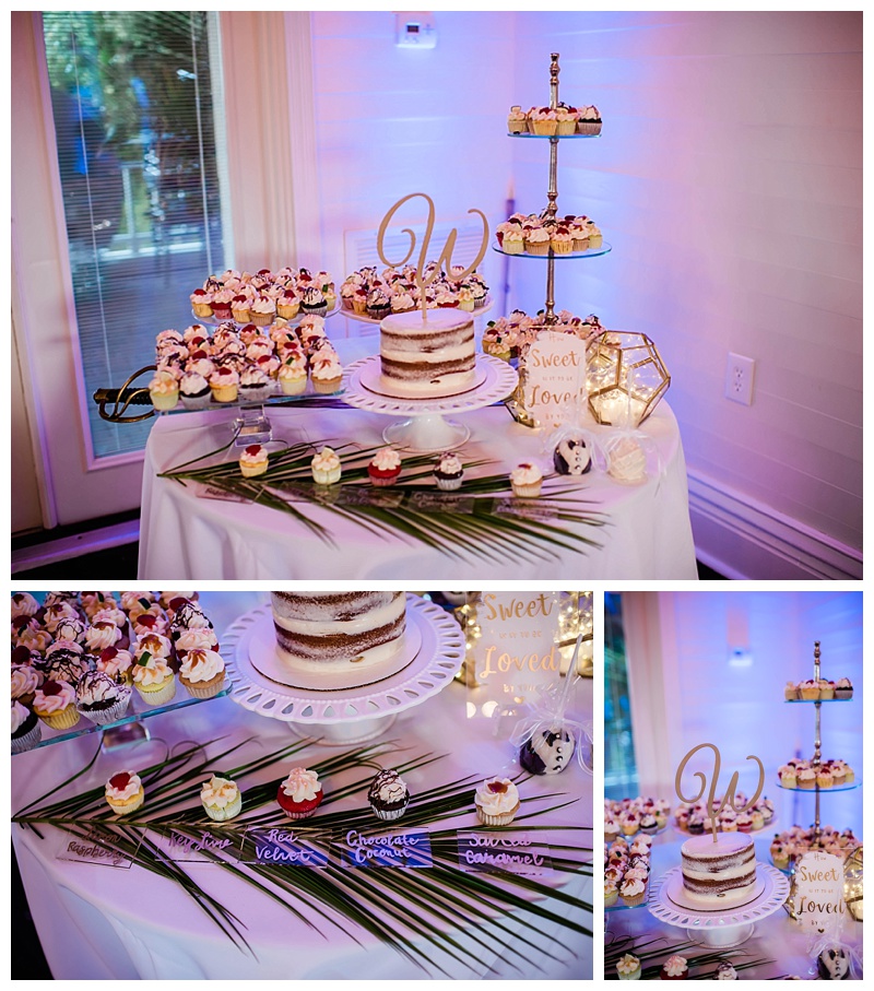 Simple white cakes and treats placed out for wedding desserts
