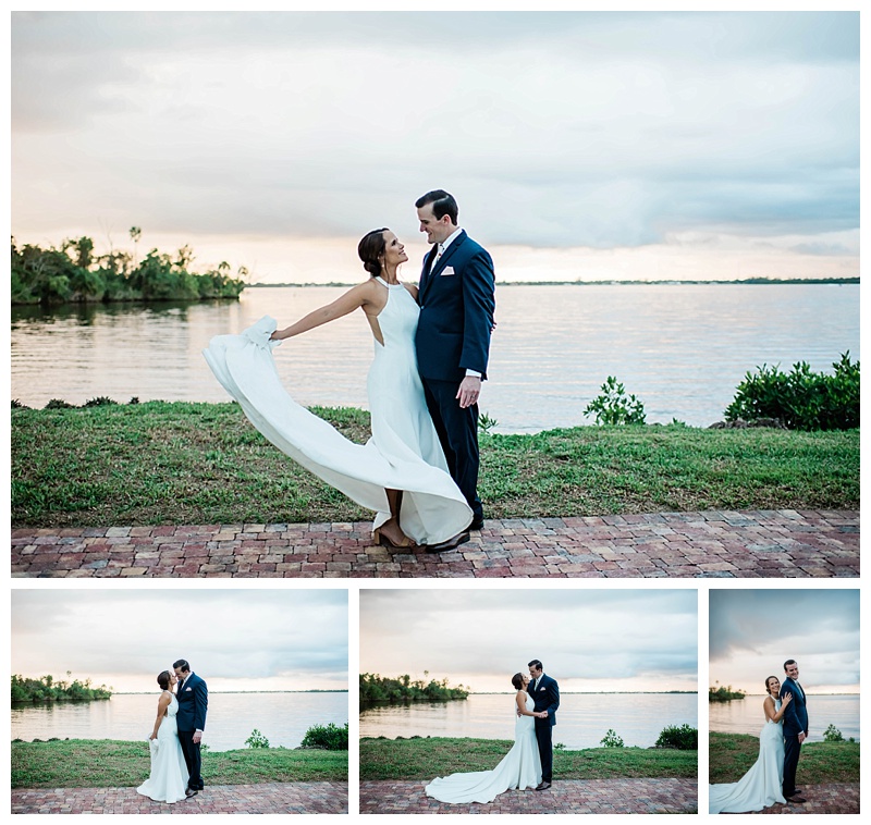 Bride and groom embrace waterfront on their wedding day