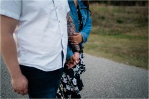 Fort Myers engaged couple holds hands during engagement session