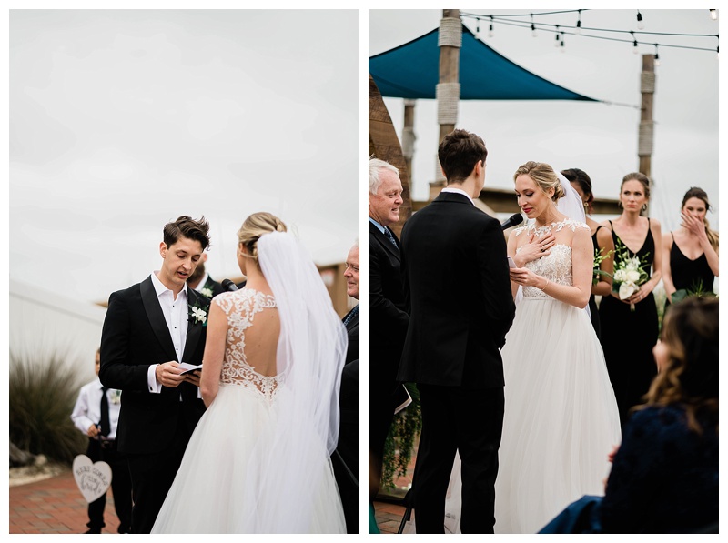 Groom tearfully smiles at bride at beach wedding altar