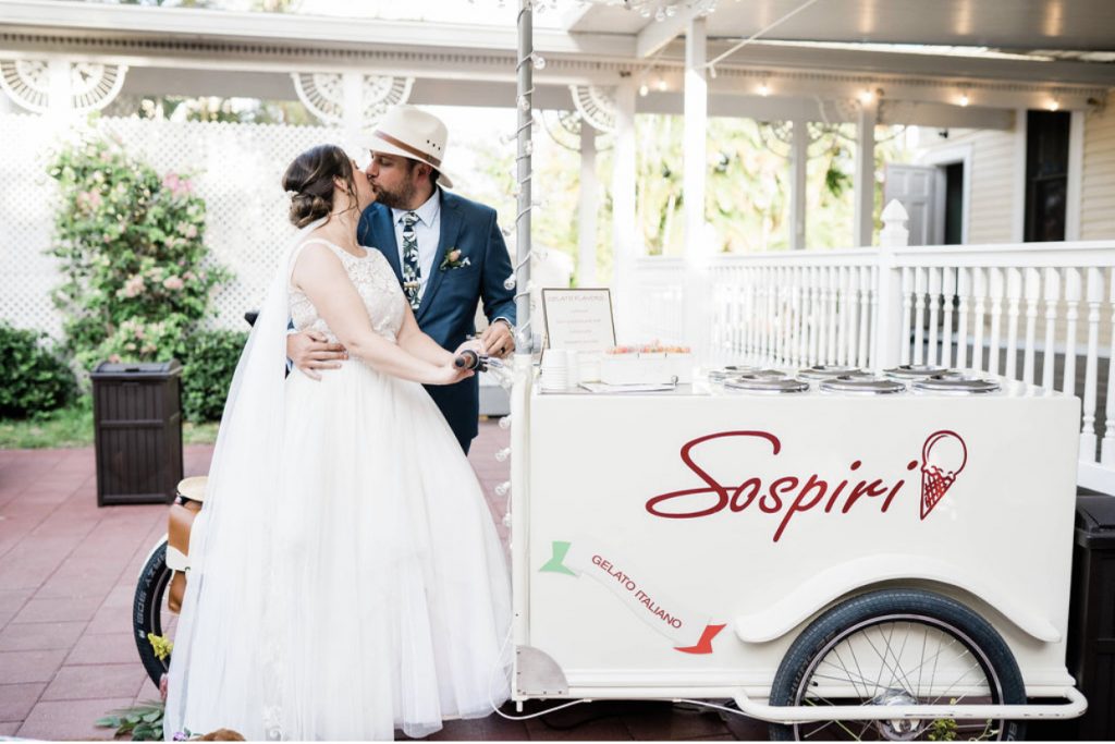 Couple kissing on ice cream cart 