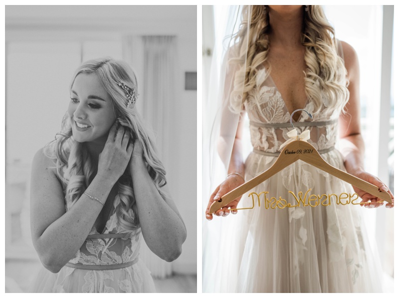 Florida bride holds hanger with name on it in gold