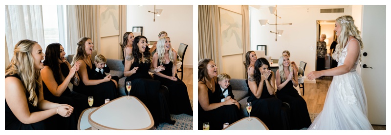 bridesmaids excitedly reacting to bride as she walks out in her gorgeous wedding gown