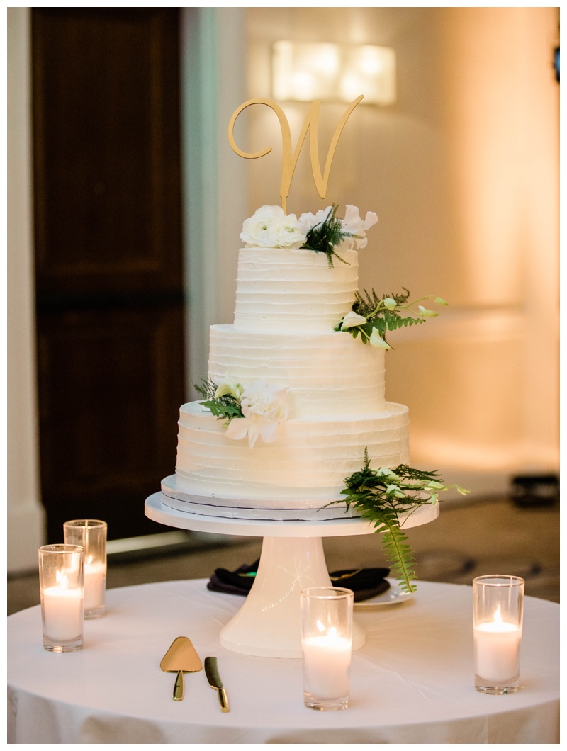 three tier white and green wedding cake