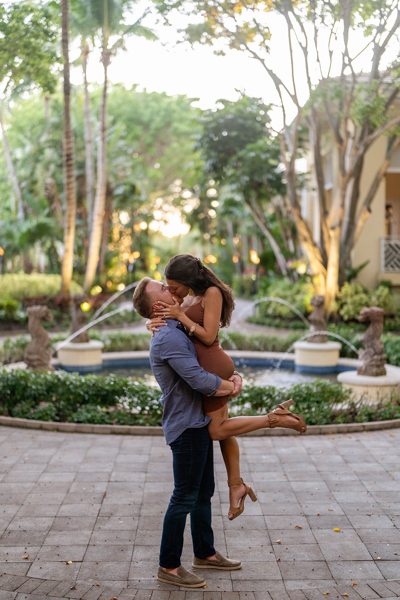 Bonita Springs Florida engagement couple kisses after woman says yes to proposal