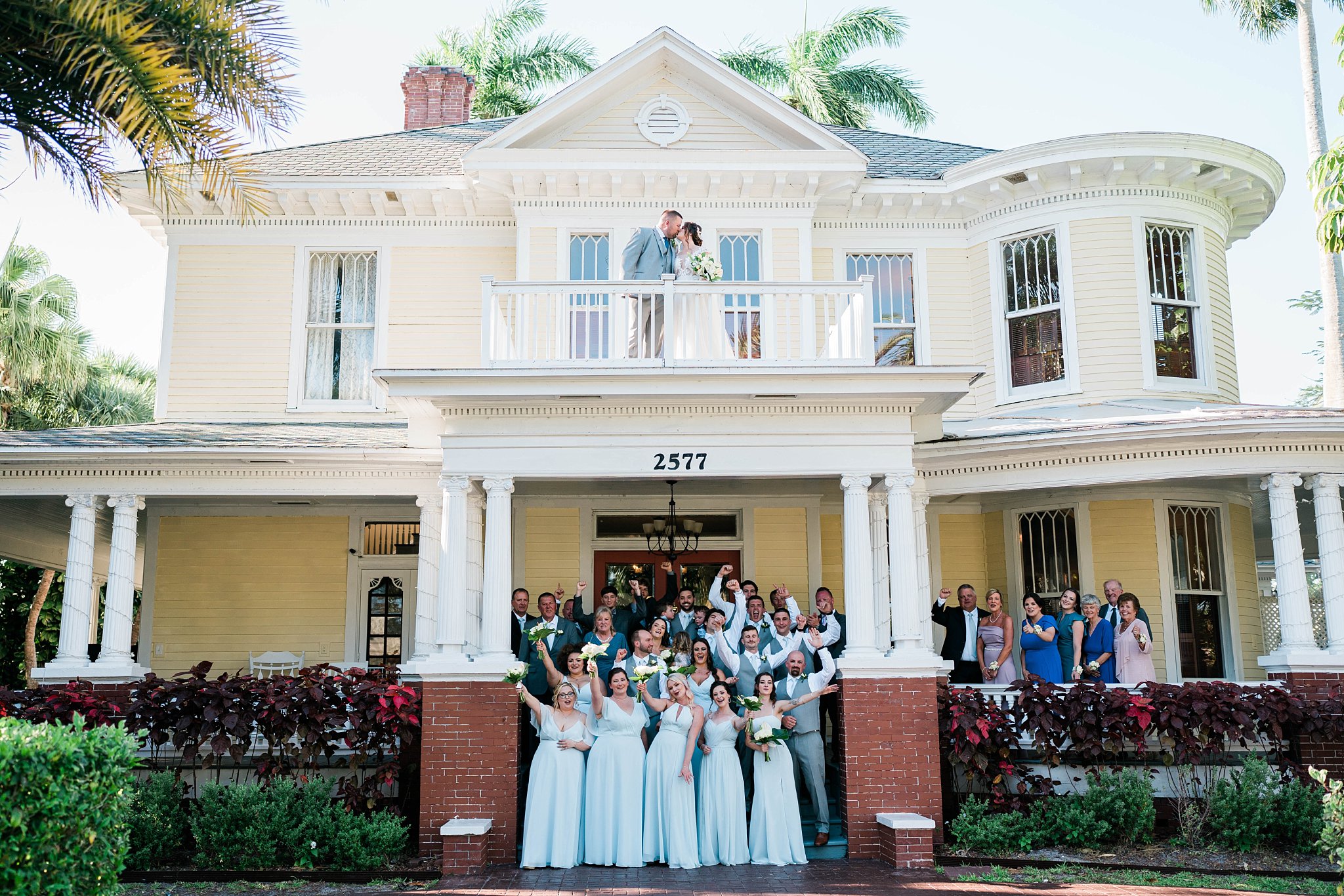 Bridal party celebrates in front of The Heitman House