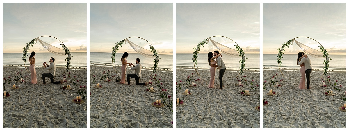 archway and florals line the beach for sunset proposal in Southwest Florida