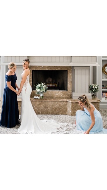 bride gets ready with bridesmaids photographed by Fort Myers wedding photographer