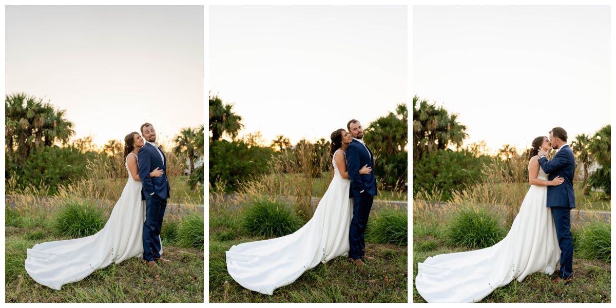 Bride and groom kiss among Florida foliage during their Southwest Florida wedding