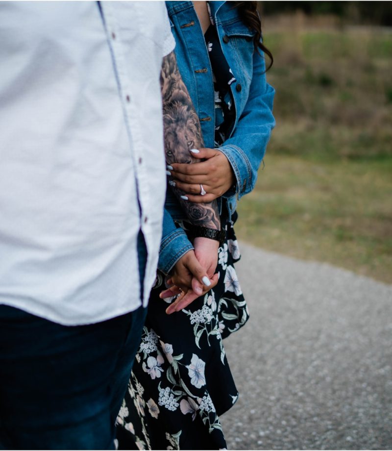 Fort Myers engaged couple holds hands during engagement session